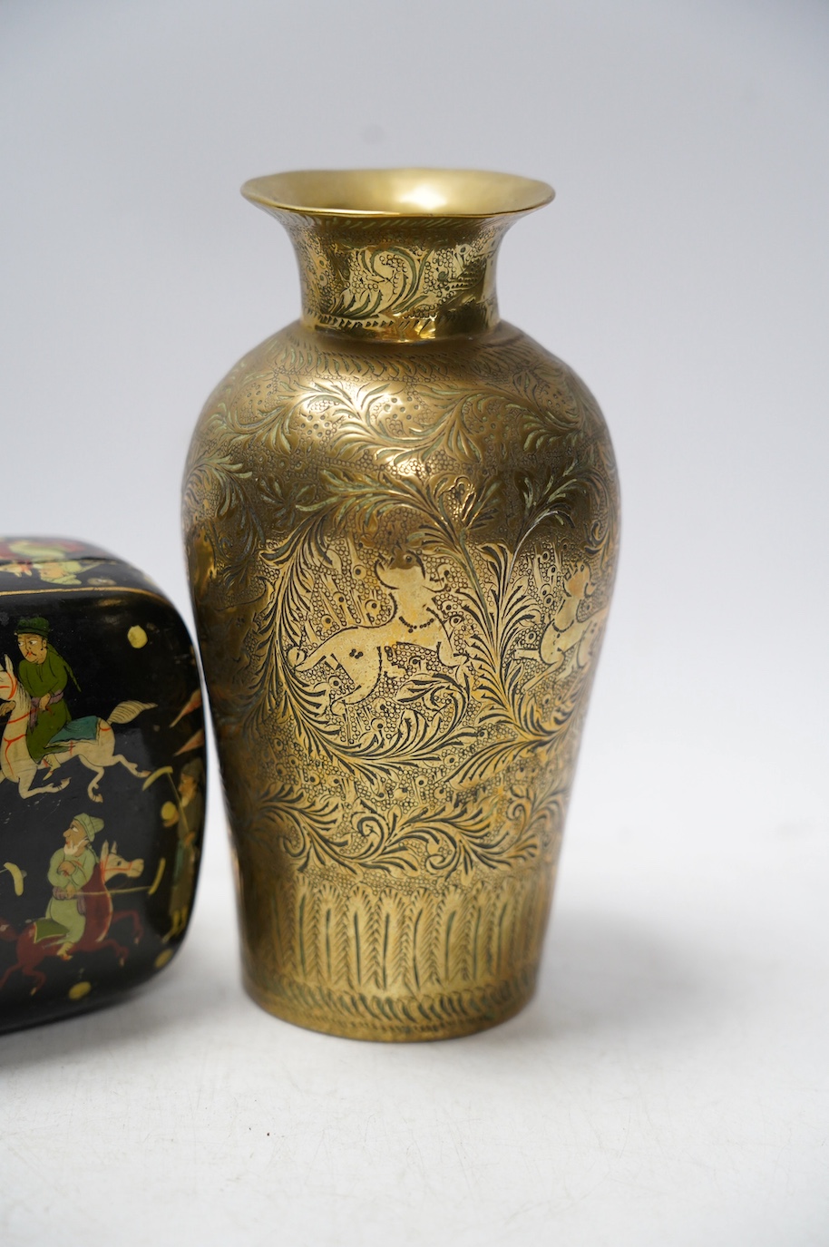 A Persian paper mache box and a brass vase with engraved decoration, largest 17cm high. Condition - vase fair, box restored